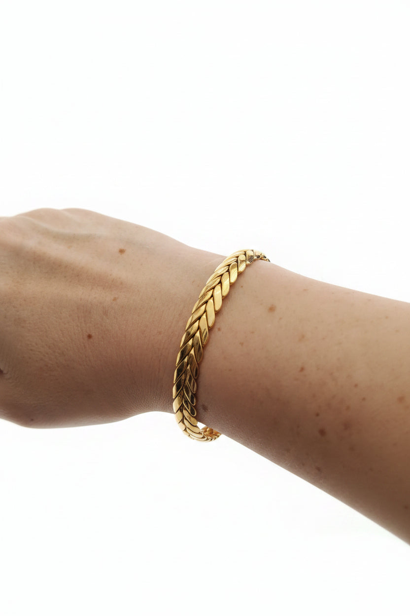 Bracciale rigido intreccio