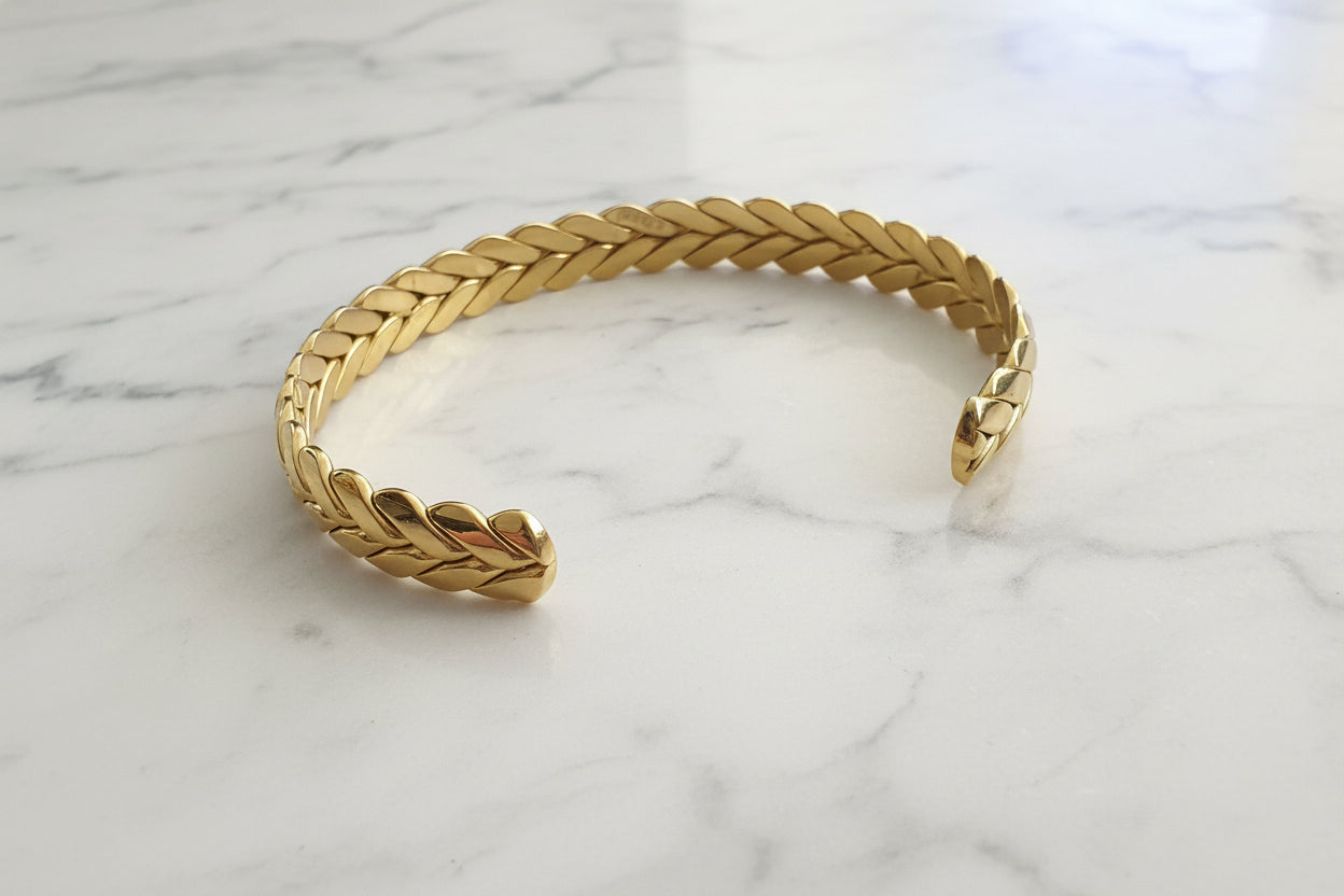Bracciale rigido intreccio